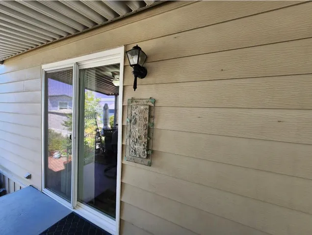 a very nice looking house with a large window
