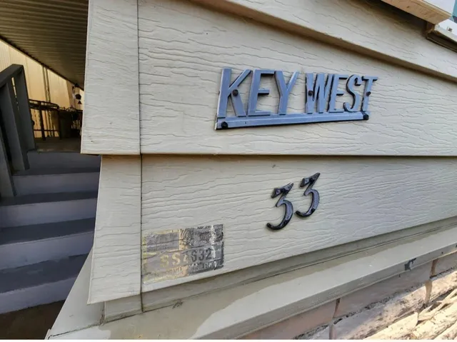 a view of a swimming pool with a lounge chair