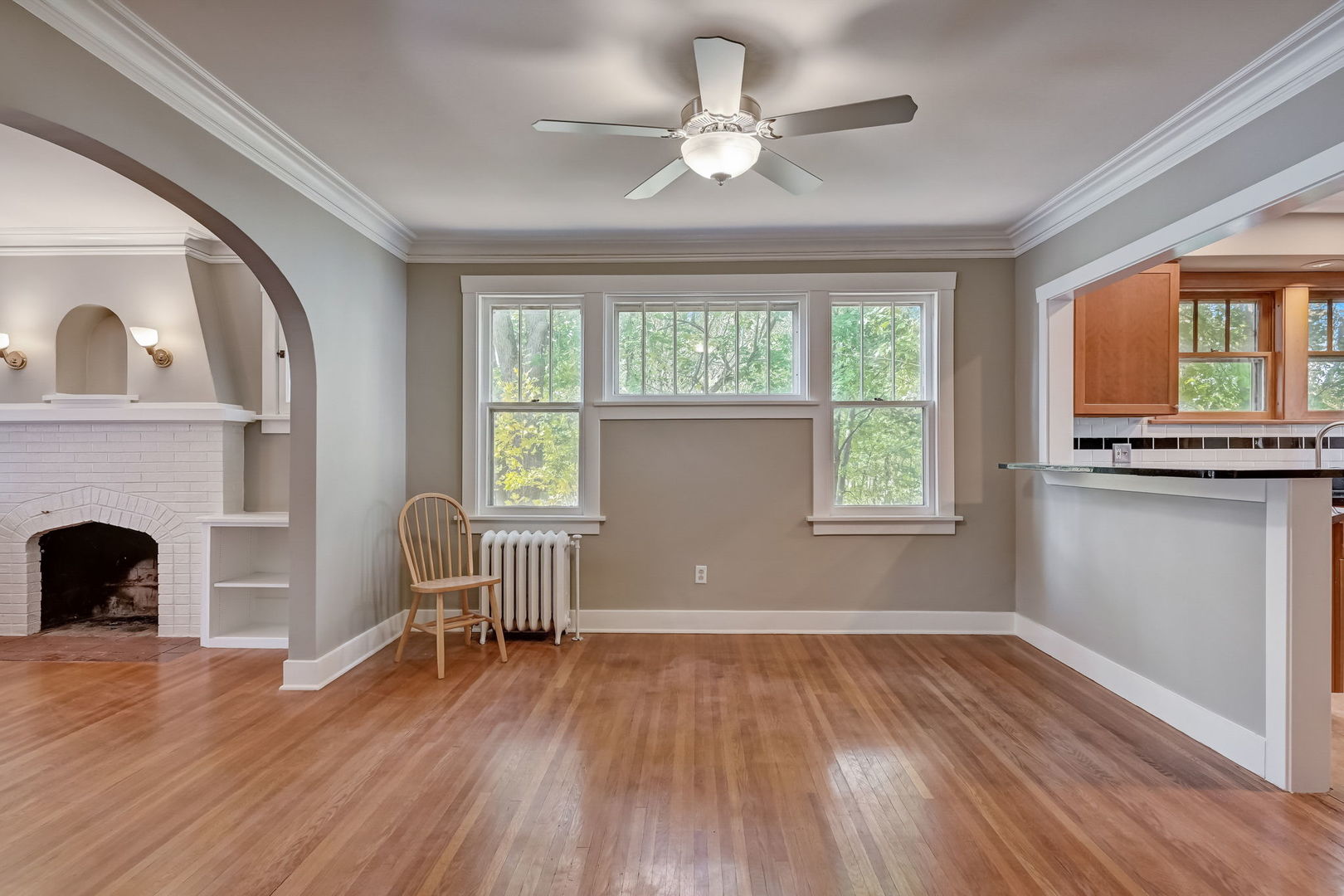 362 River Bluff Road Elgin, IL 60120 - Photo 18 of 57 a view of empty room with wooden floor and fan