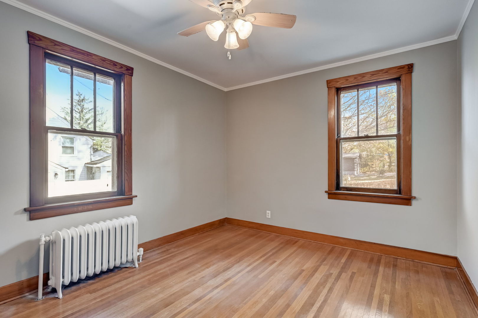 362 River Bluff Road Elgin, IL 60120 - Photo 23 of 57 a view of an empty room with wooden floor and a window