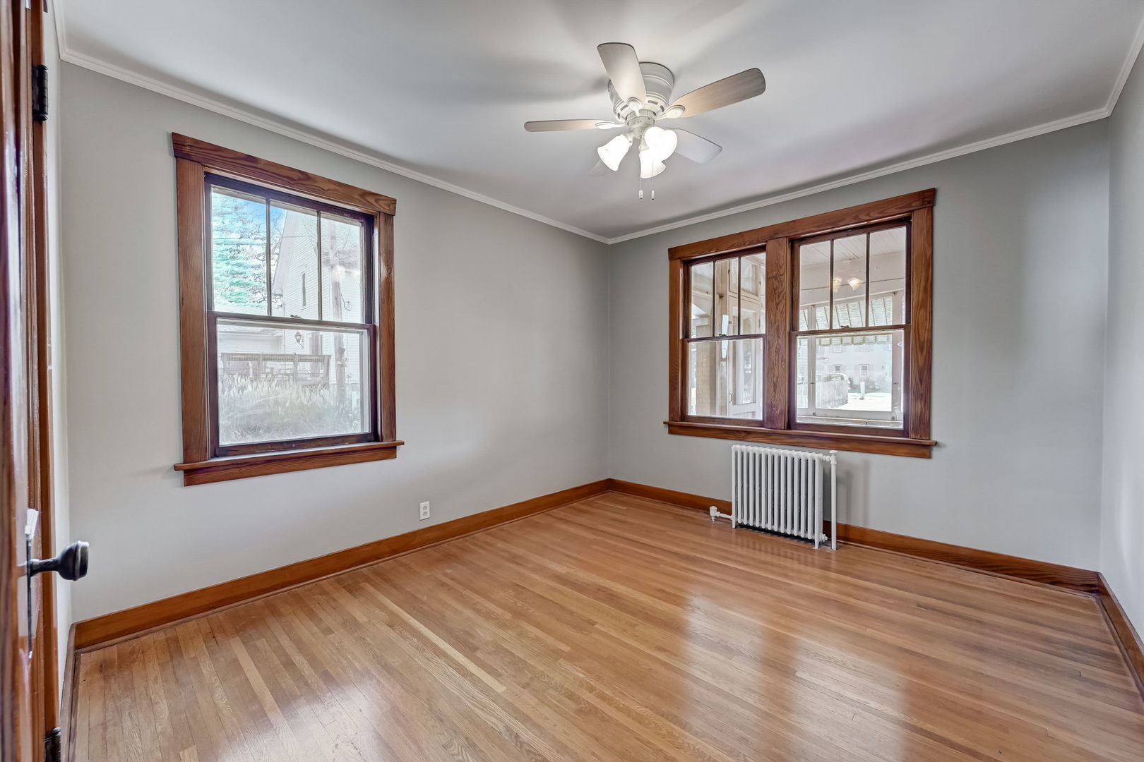 362 River Bluff Road Elgin, IL 60120 - Photo 27 of 57 a view of an empty room with wooden floor and a window
