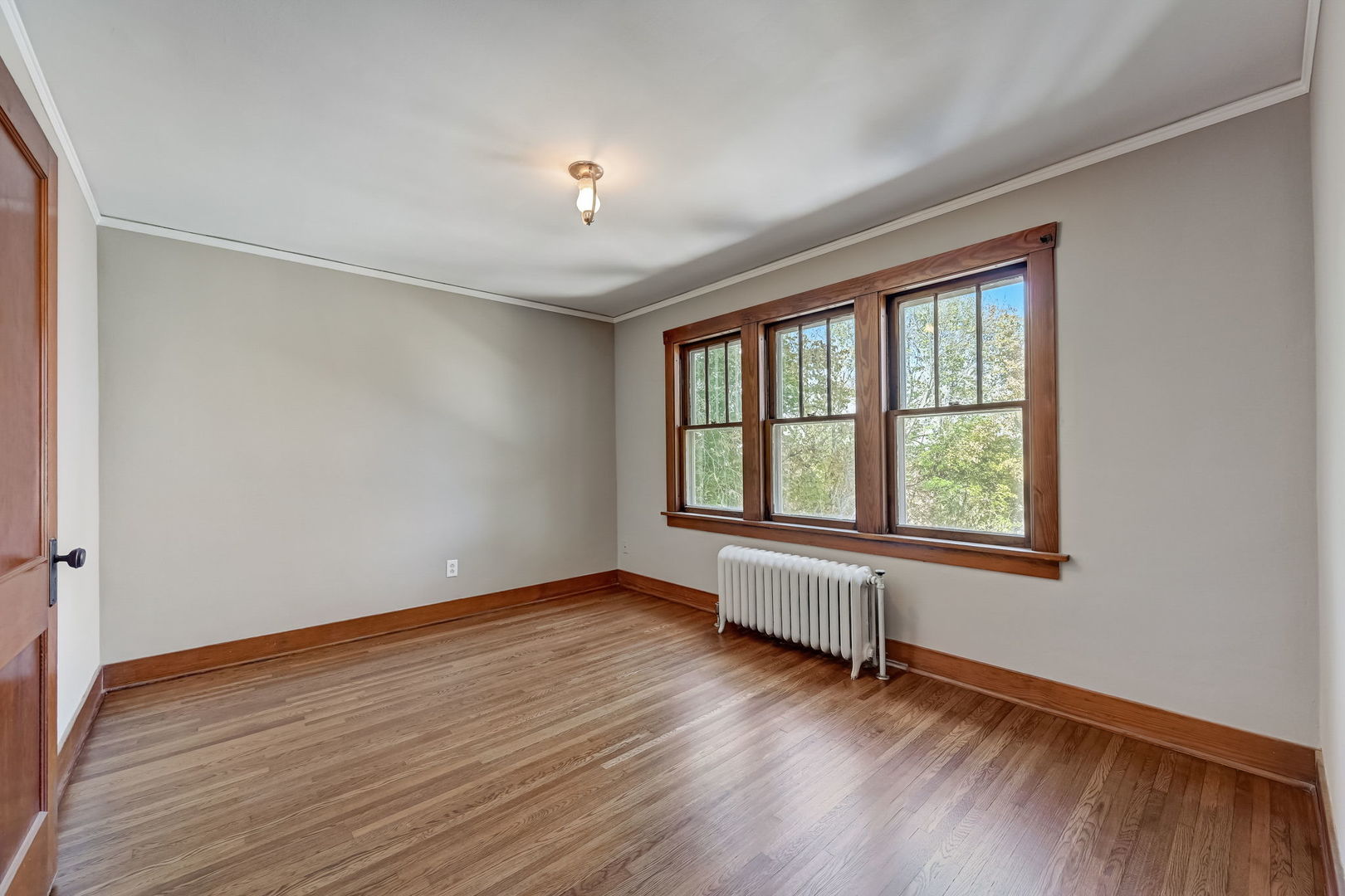 362 River Bluff Road Elgin, IL 60120 - Photo 30 of 57 an empty room with wooden floor and windows