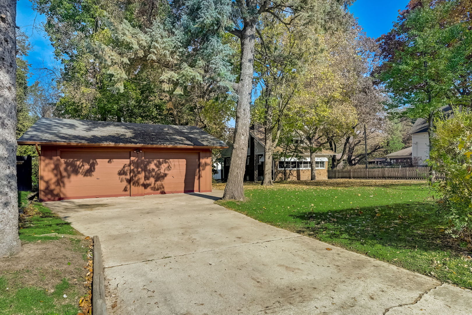 362 River Bluff Road Elgin, IL 60120 - Photo 3 of 57 a front view of a house with a yard and garage