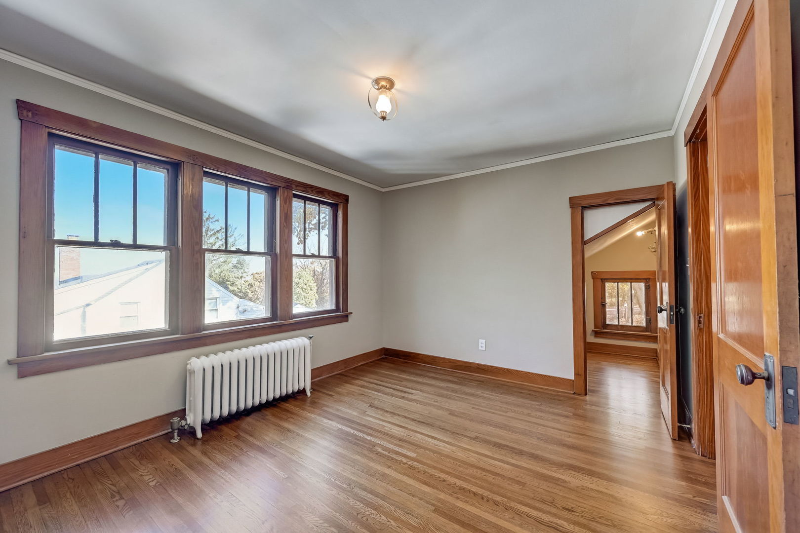 362 River Bluff Road Elgin, IL 60120 - Photo 31 of 57 an empty room with wooden floor and windows