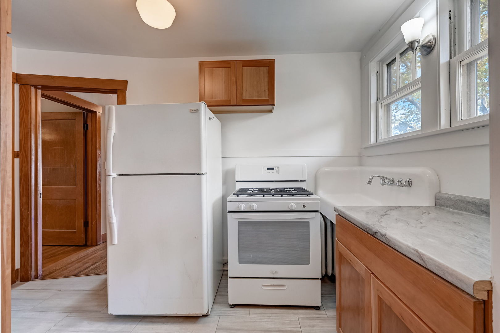 362 River Bluff Road Elgin, IL 60120 - Photo 40 of 57 a kitchen with a refrigerator sink stove and cabinets