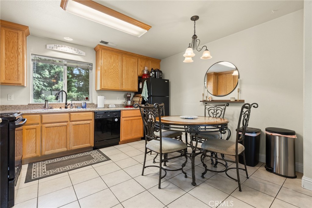 38 Kobe Loop Chico, CA 95973 - Photo 23 of 38 a kitchen with a sink cabinets and window