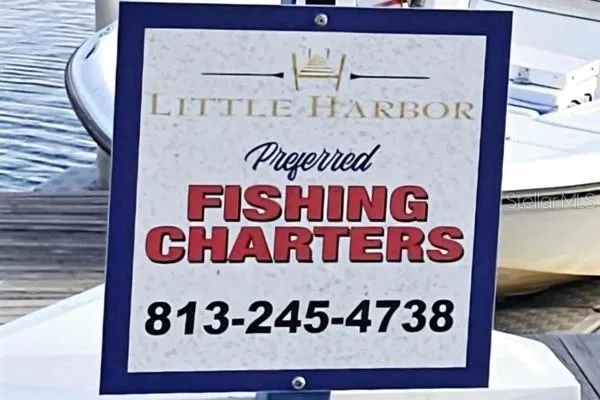 a view of a lake with a yard