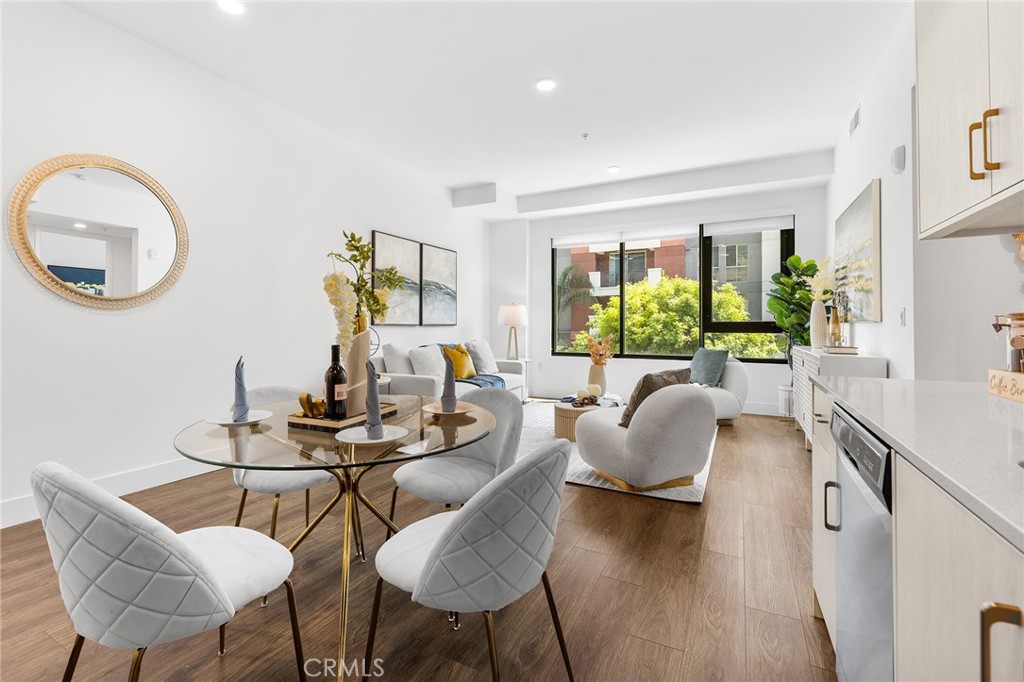 709 East Walnut Street, Unit 227 Pasadena, CA 91101 - Photo 10 of 42 a living room with furniture and a large window