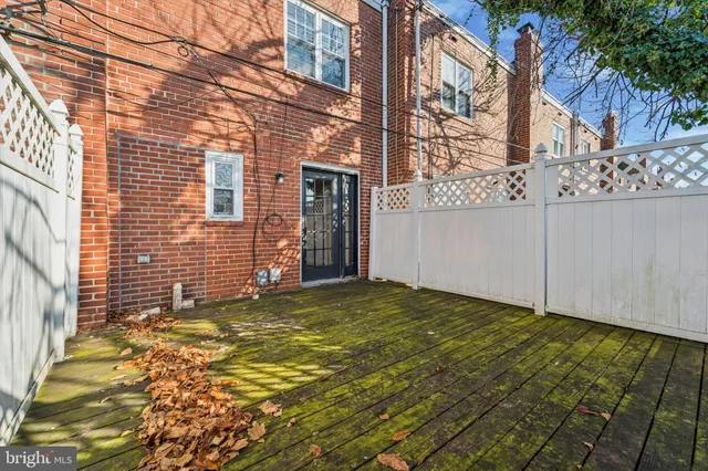a front view of a house with patio