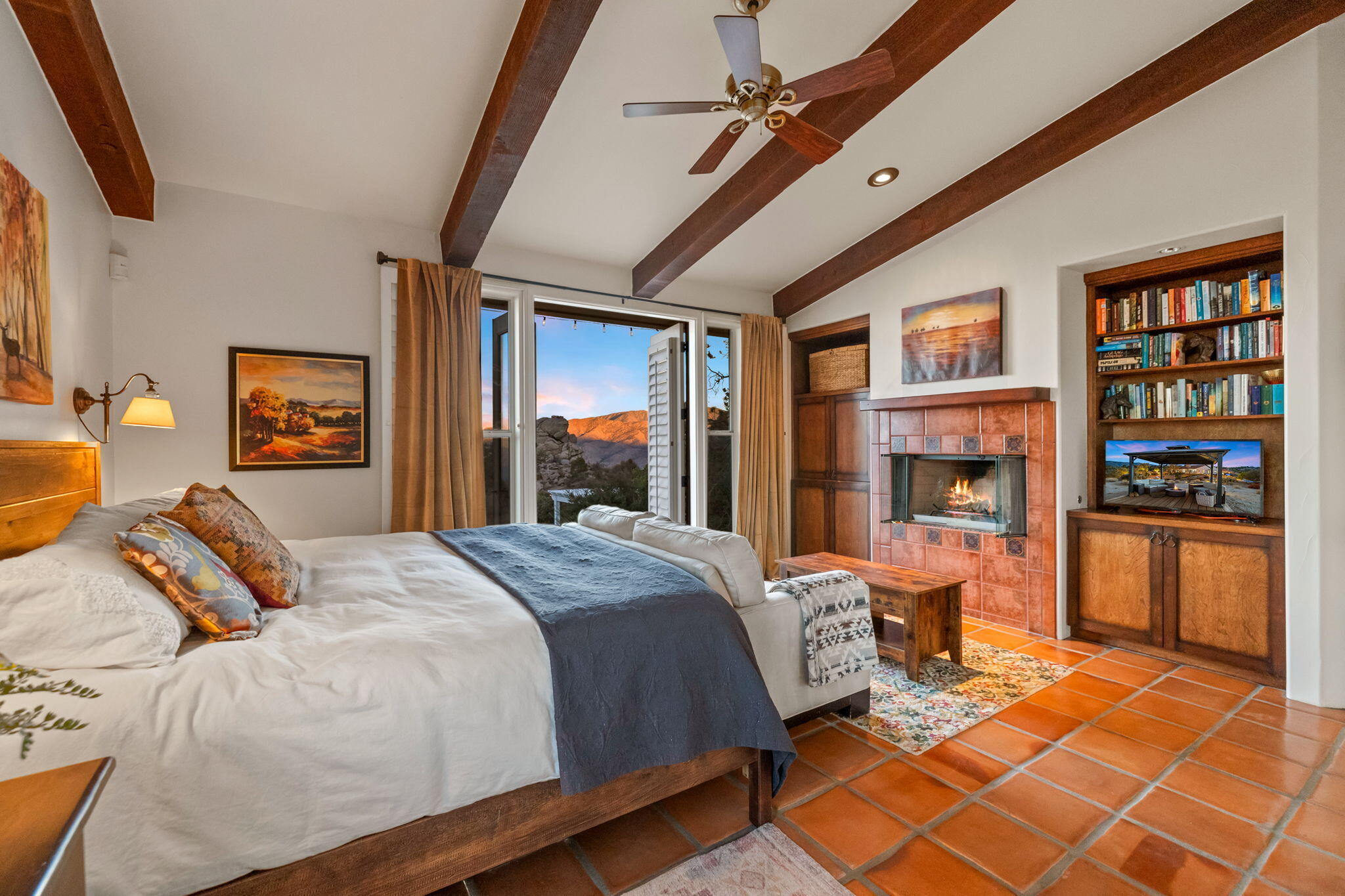 60150 Santa Rosa Road Mountain Center, CA 92561 - Photo 14 of 62 a bedroom with a bed wooden floor and window