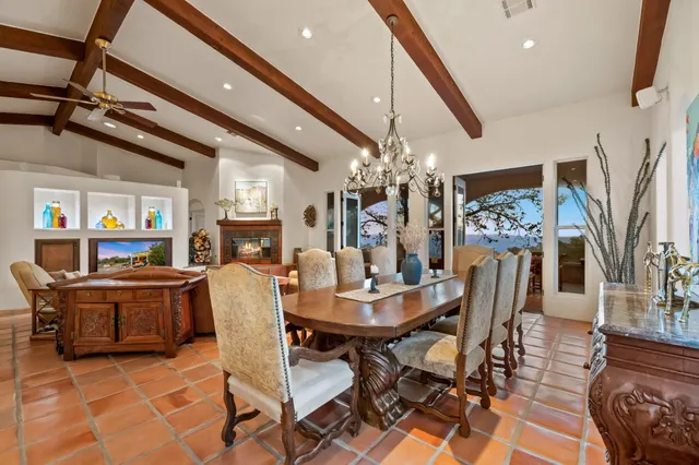 a view of a swimming pool with a yard