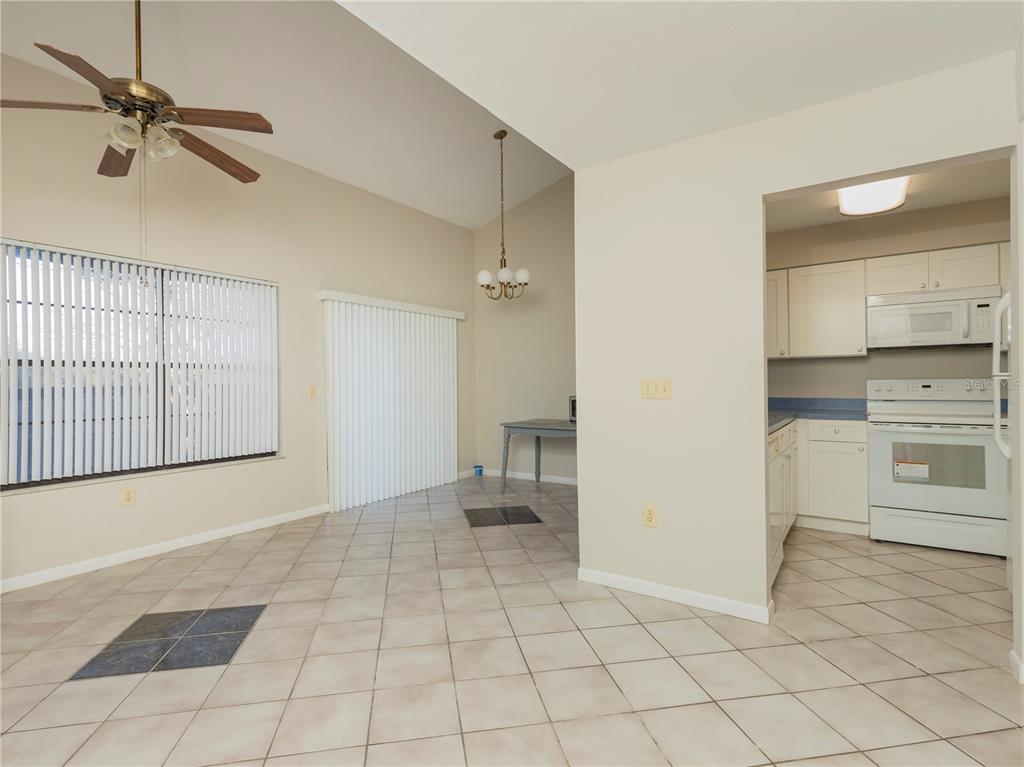 4356 Southwest 20th Lane Gainesville, FL 32607 - Photo 5 of 15 a view of a kitchen with a sink and dishwasher cabinets