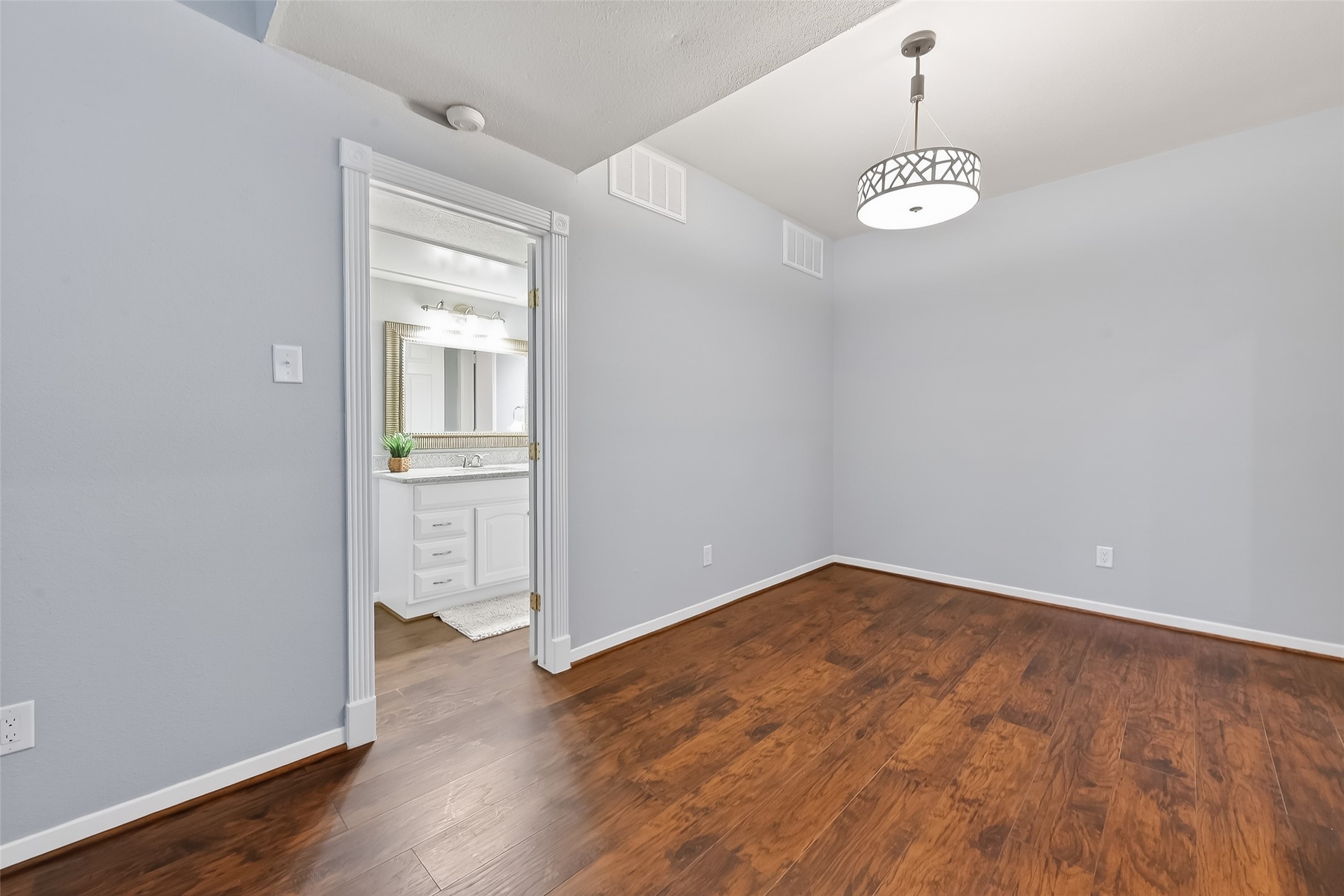 2100 Tanglewilde Street, Unit 740 Houston, TX 77063 - Photo 15 of 40 Entrance into second/ guest bath. Either bedroom could be primary. Both ensuite and similar size