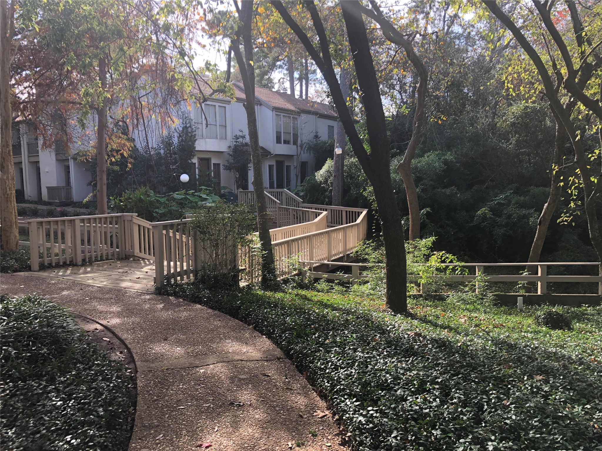 2100 Tanglewilde Street, Unit 740 Houston, TX 77063 - Photo 29 of 40 The Oaks has beautiful wooded grounds covering 27 acres. This scenic bridge crosses over a ravine