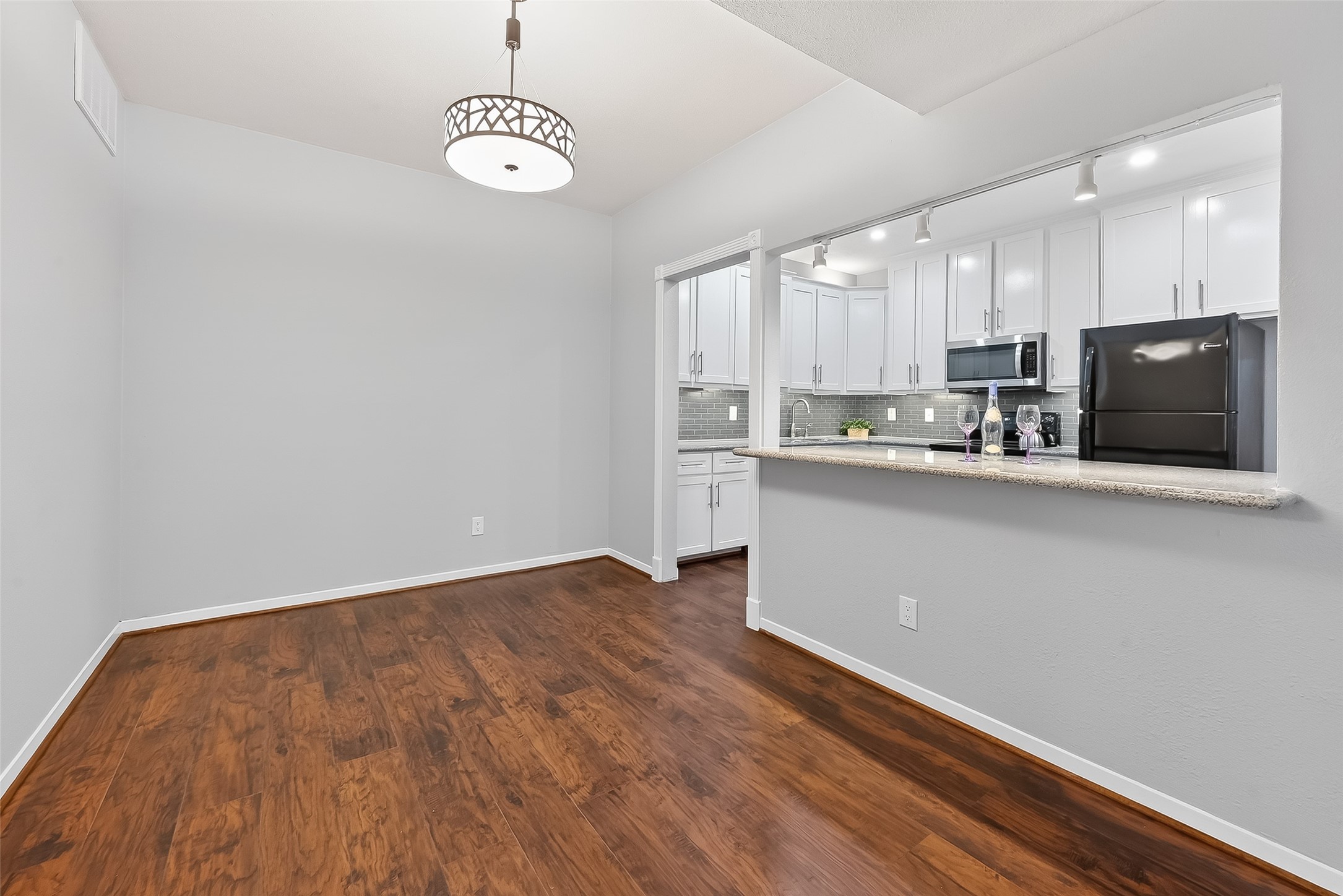 2100 Tanglewilde Street, Unit 740 Houston, TX 77063 - Photo 10 of 40 Dining space that can accommodate all your dining room furniture