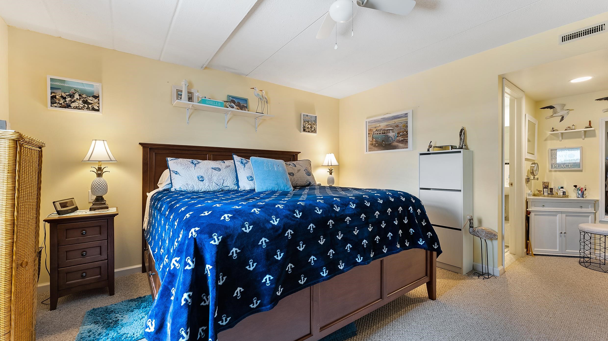 208 East Forget-Me-Not Road, Unit 103 Wildwood Crest, NJ 08260 - Photo 13 of 20 a bedroom with a bed and a view of living room