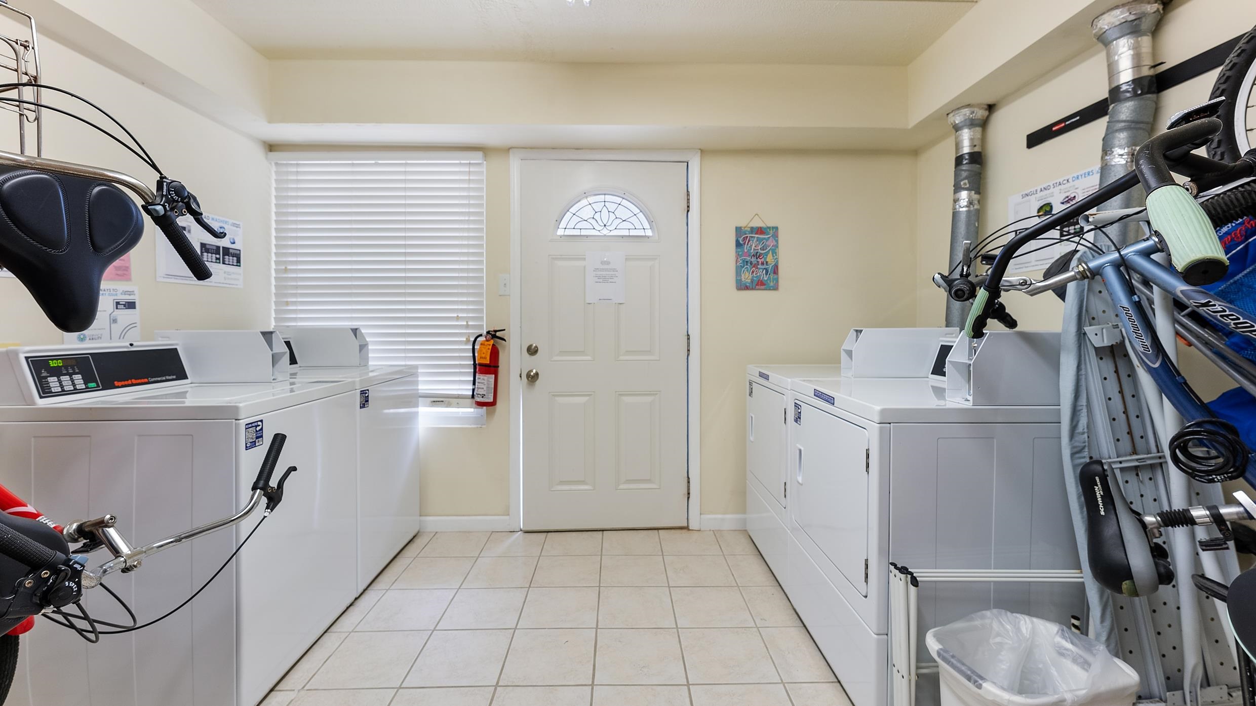 208 East Forget-Me-Not Road, Unit 103 Wildwood Crest, NJ 08260 - Photo 20 of 20 a utility room with sink dryer and washer