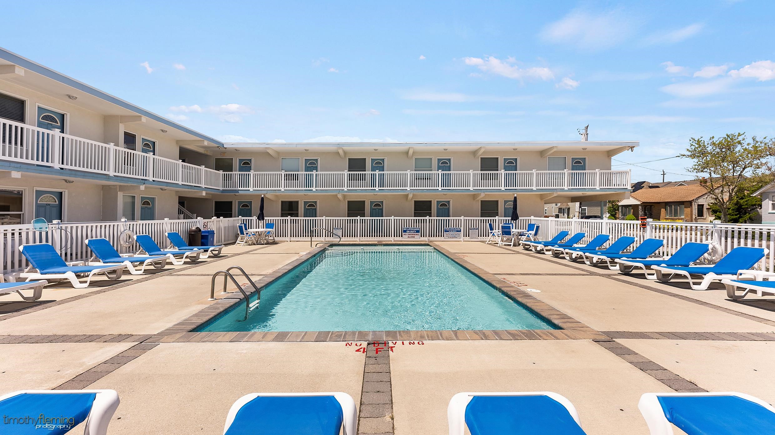 208 East Forget-Me-Not Road, Unit 103 Wildwood Crest, NJ 08260 - Photo 5 of 20 a view of a swimming pool with outdoor seating