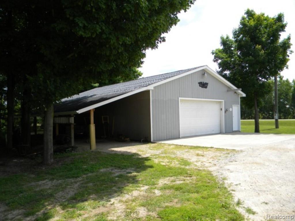 12988 Yale Road Yale, MI 48097 - Photo 21 of 29 This is a view of the lean to on the pole barn.