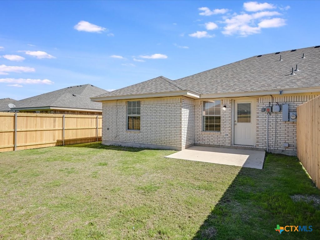 3805 El Paso Drive, Unit A Killeen, TX 76549 - Photo 19 of 20 a backyard of a house with large garden and outdoor seating