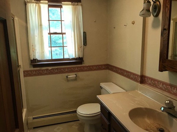 370 Winthrop Street Rehoboth, MA 02769 - Photo 12 of 22 a bathroom with a sink and a toilet