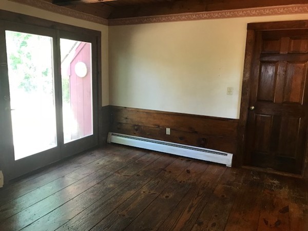 370 Winthrop Street Rehoboth, MA 02769 - Photo 4 of 22 a view of room with window and wooden floor
