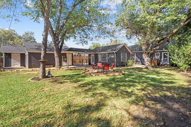 a front view of a house with patio