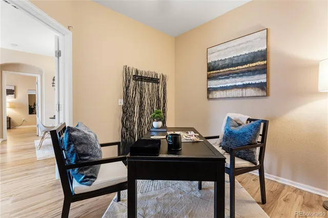 a view of a workspace with furniture