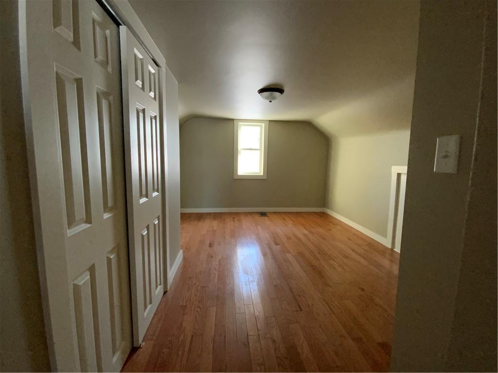 75 Meneely Road Burgettstown, PA 15021 - Photo 10 of 11 an empty room with wooden floor and windows