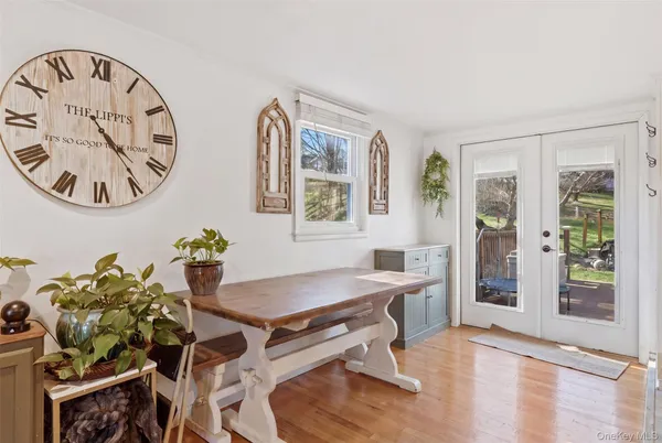 a workspace with furniture and window