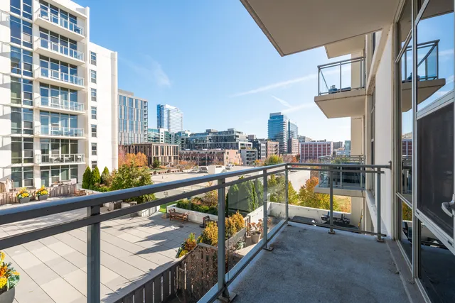 a view of swimming pool from a balcony