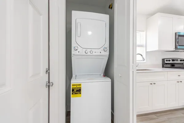 a utility room with dryer and washer