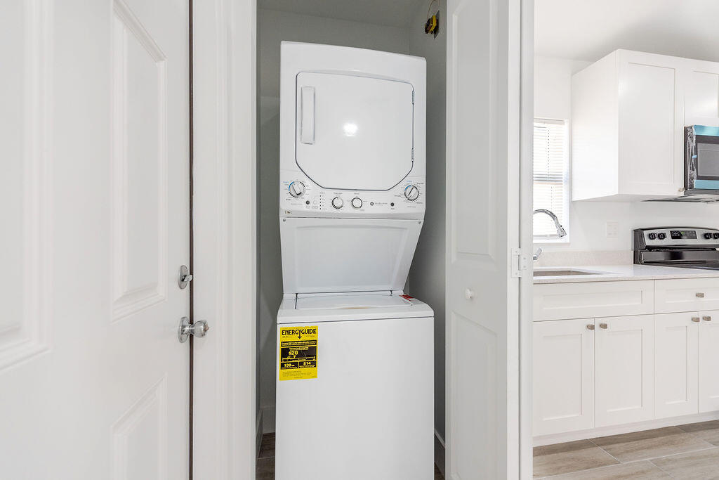 3246 Jefferson Street Stuart, FL 34997 - Photo 17 of 19 a utility room with dryer and washer