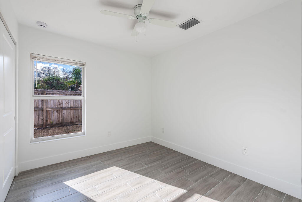 3246 Jefferson Street Stuart, FL 34997 - Photo 9 of 19 an empty room with a window
