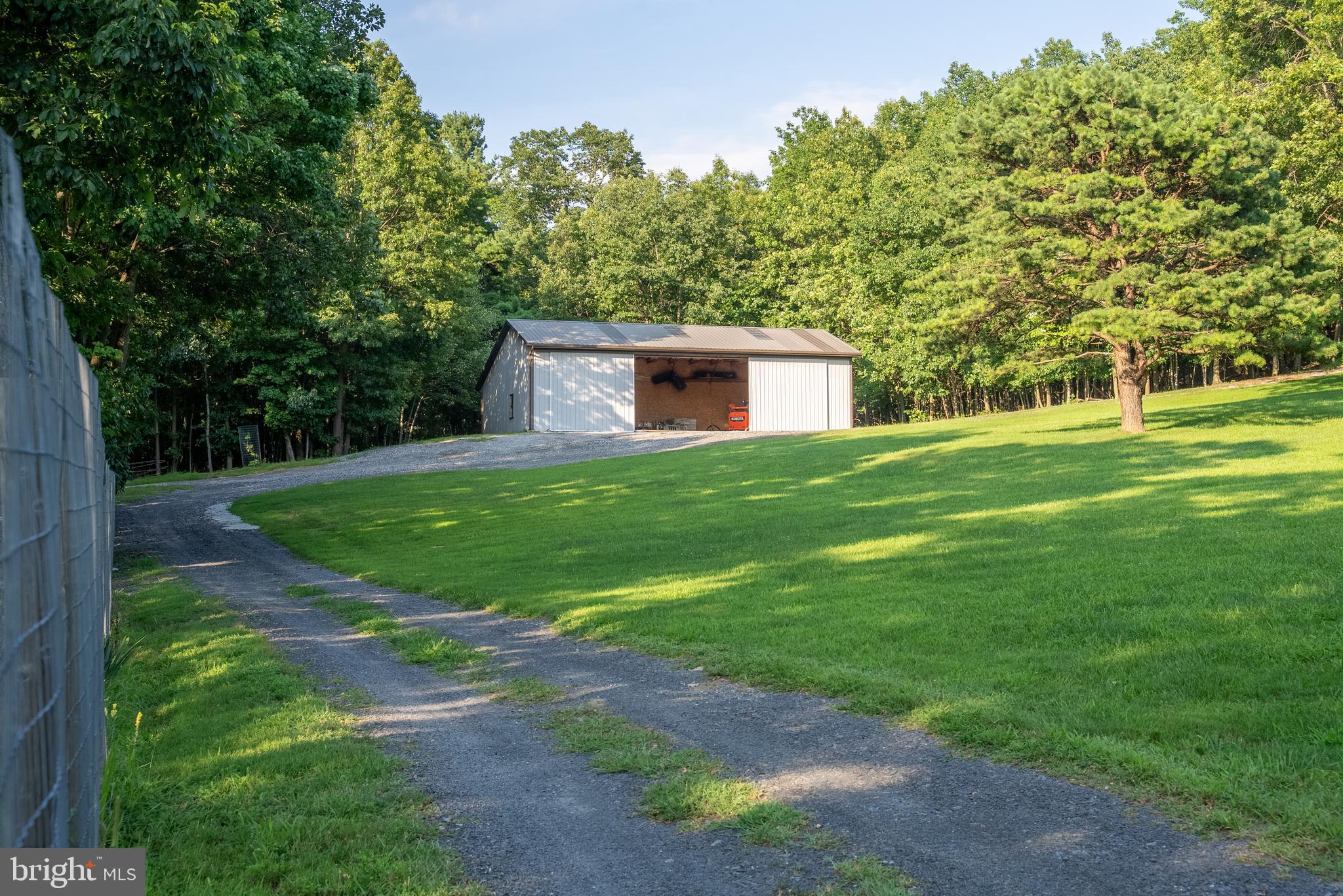 3035 Stillhouse Hollow Road Shippensburg, PA 17257 - Photo 25 of 129 a view of a backyard with large trees