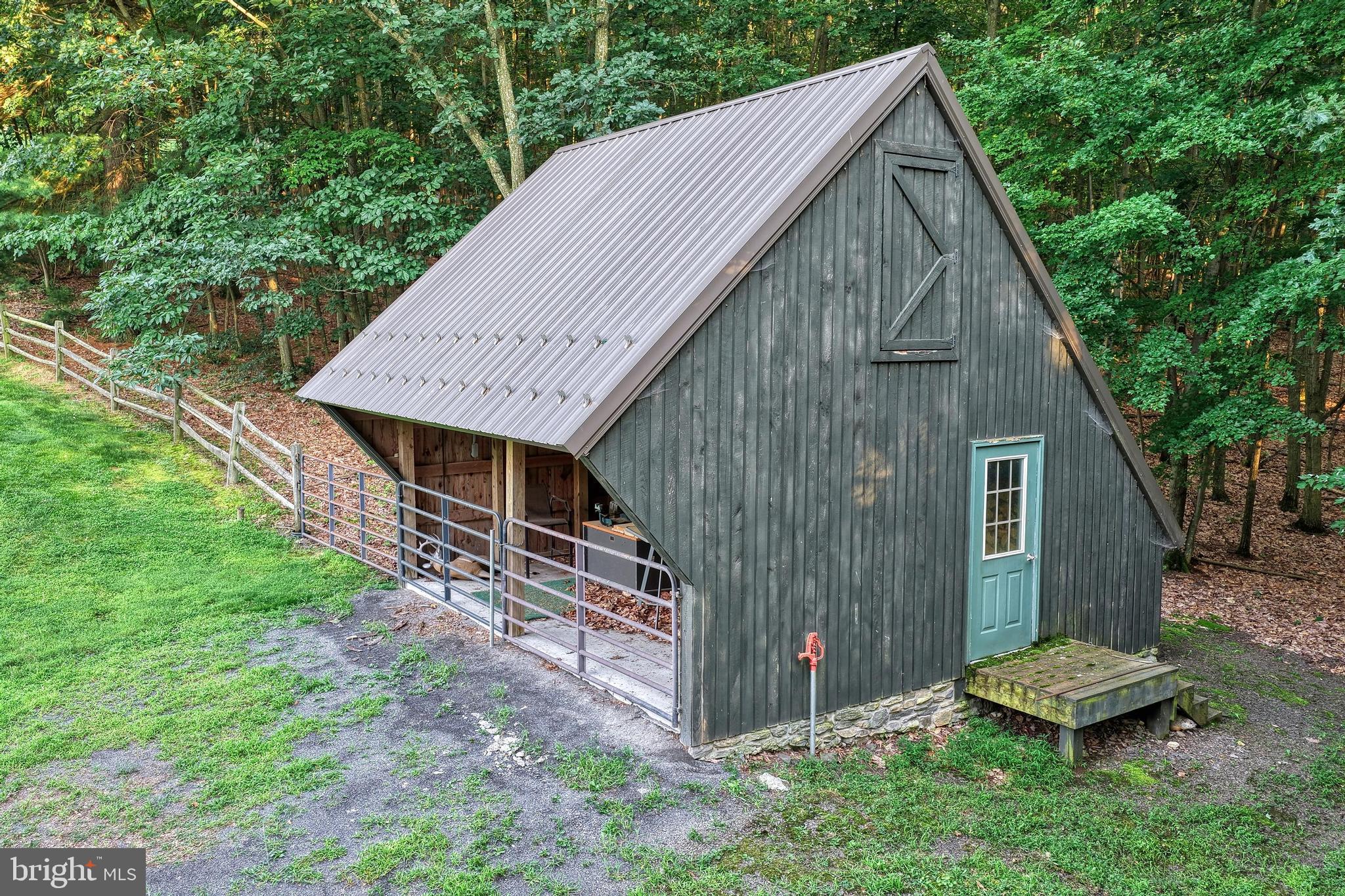 3035 Stillhouse Hollow Road Shippensburg, PA 17257 - Photo 41 of 129 a backyard of a house with lots of green space