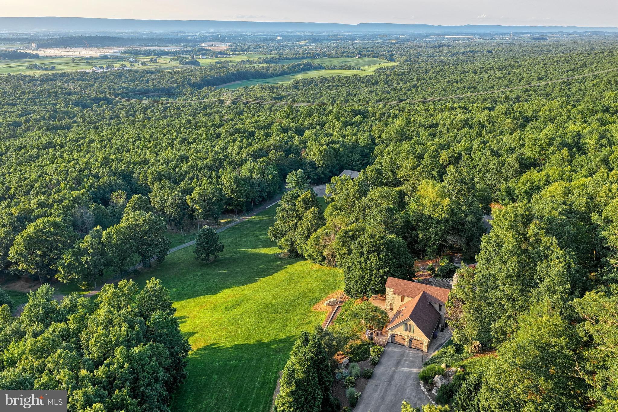3035 Stillhouse Hollow Road Shippensburg, PA 17257 - Photo 53 of 129 an aerial view of residential houses with outdoor space and trees