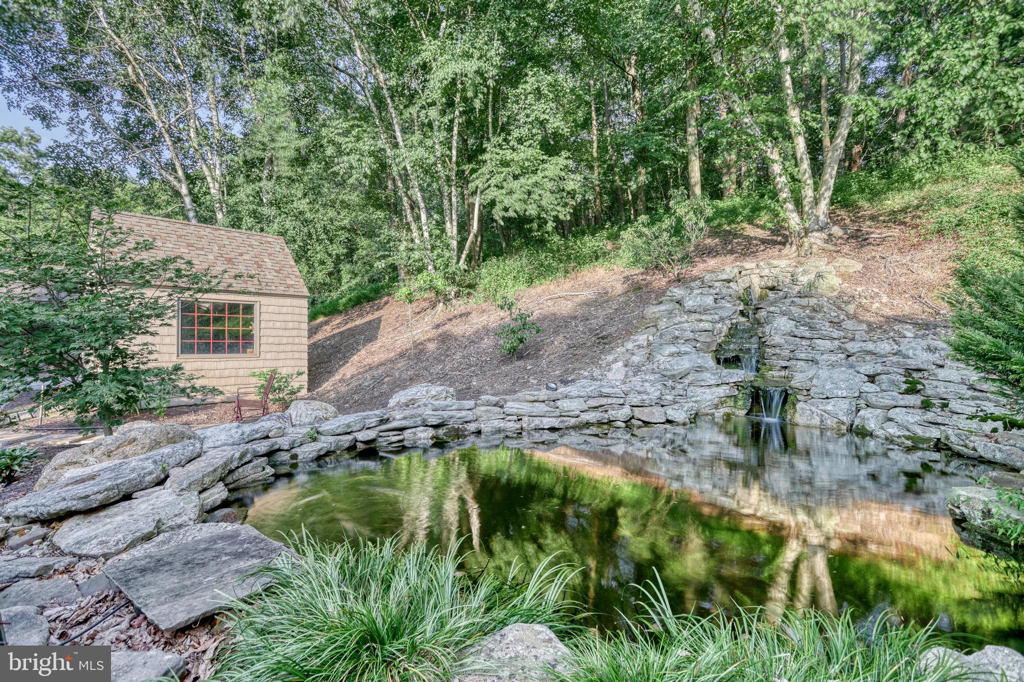 3035 Stillhouse Hollow Road Shippensburg, PA 17257 - Photo 74 of 129 a backyard of a house with a yard and outdoor seating