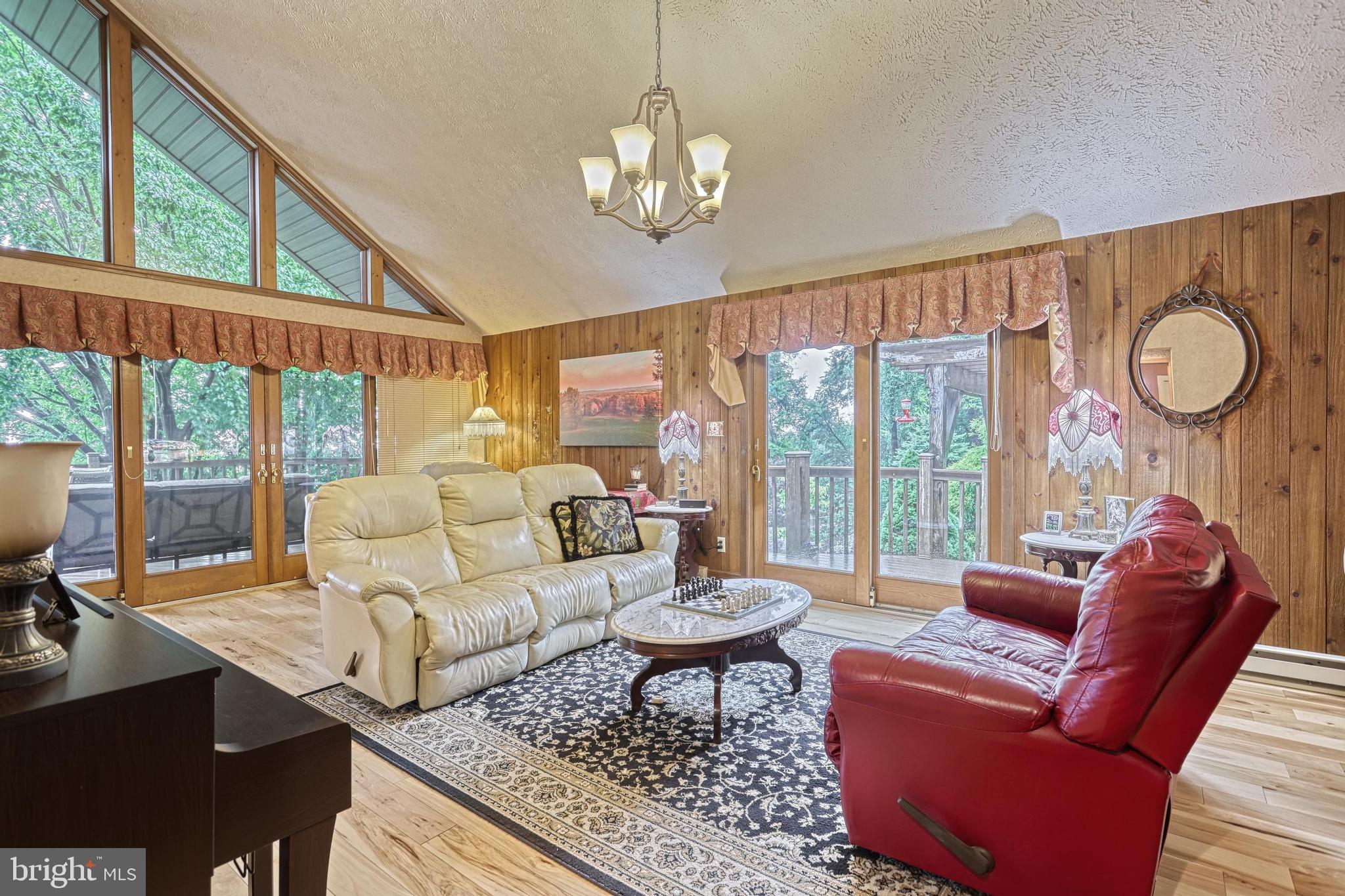 3035 Stillhouse Hollow Road Shippensburg, PA 17257 - Photo 95 of 129 a living room with furniture and a large window