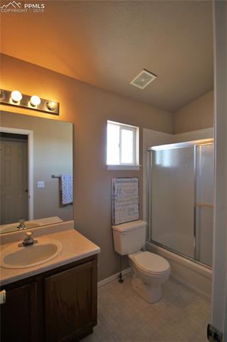 8695 Garrison Road Peyton, CO 80831 - Photo 13 of 22 Upper bathroom