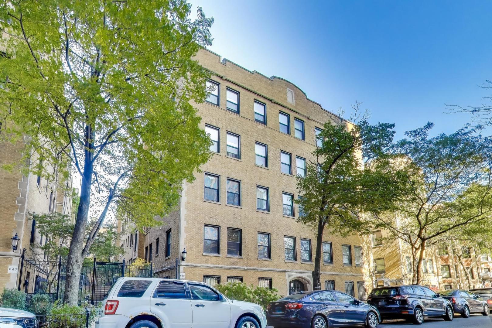 636 West Waveland Avenue, Unit 2E Chicago, IL 60613 - Photo 2 of 23 a front view of a building with trees