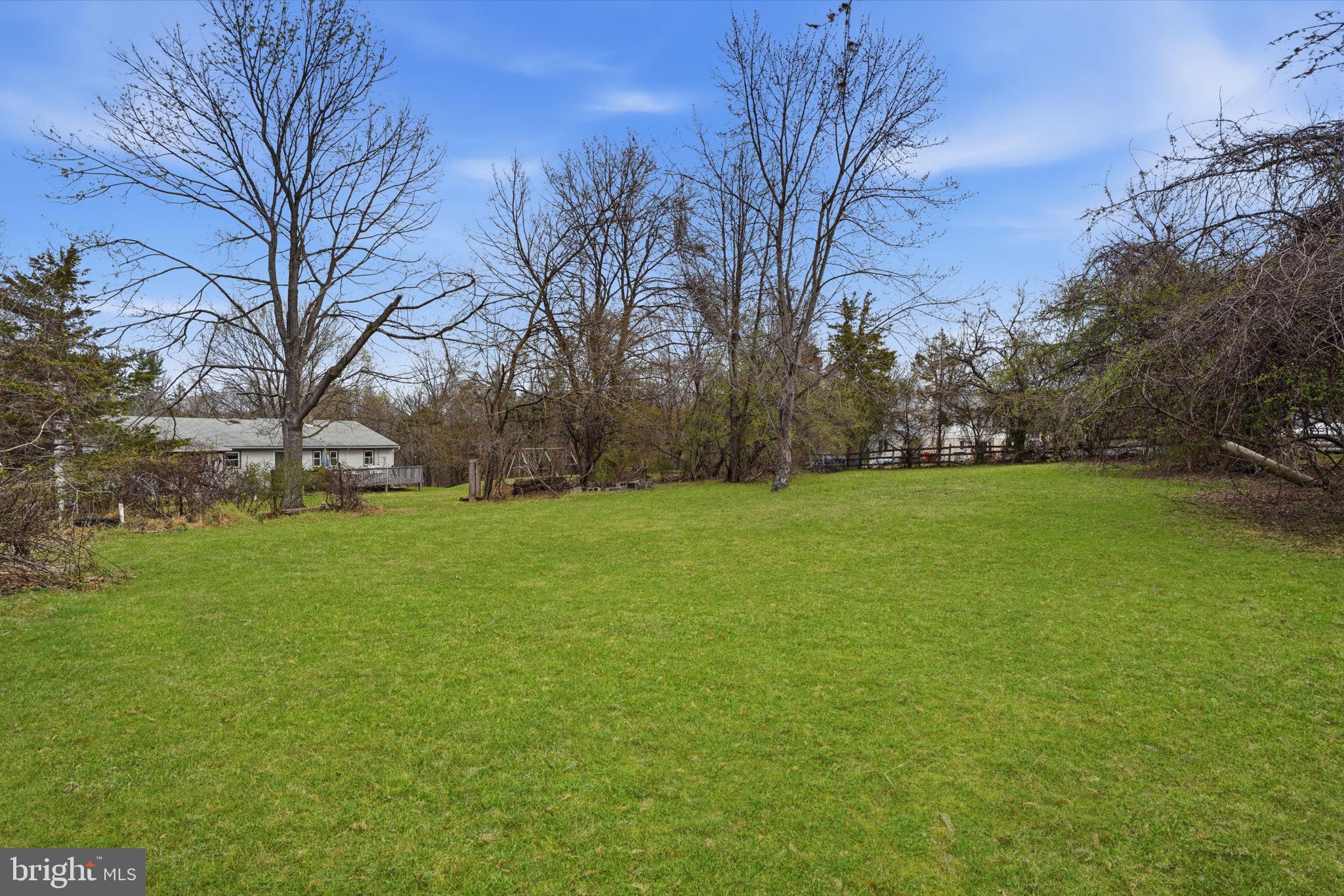 34 Aqueduct Road Washington Crossing, PA 18977 - Photo 24 of 38 a view of a field of grass and trees