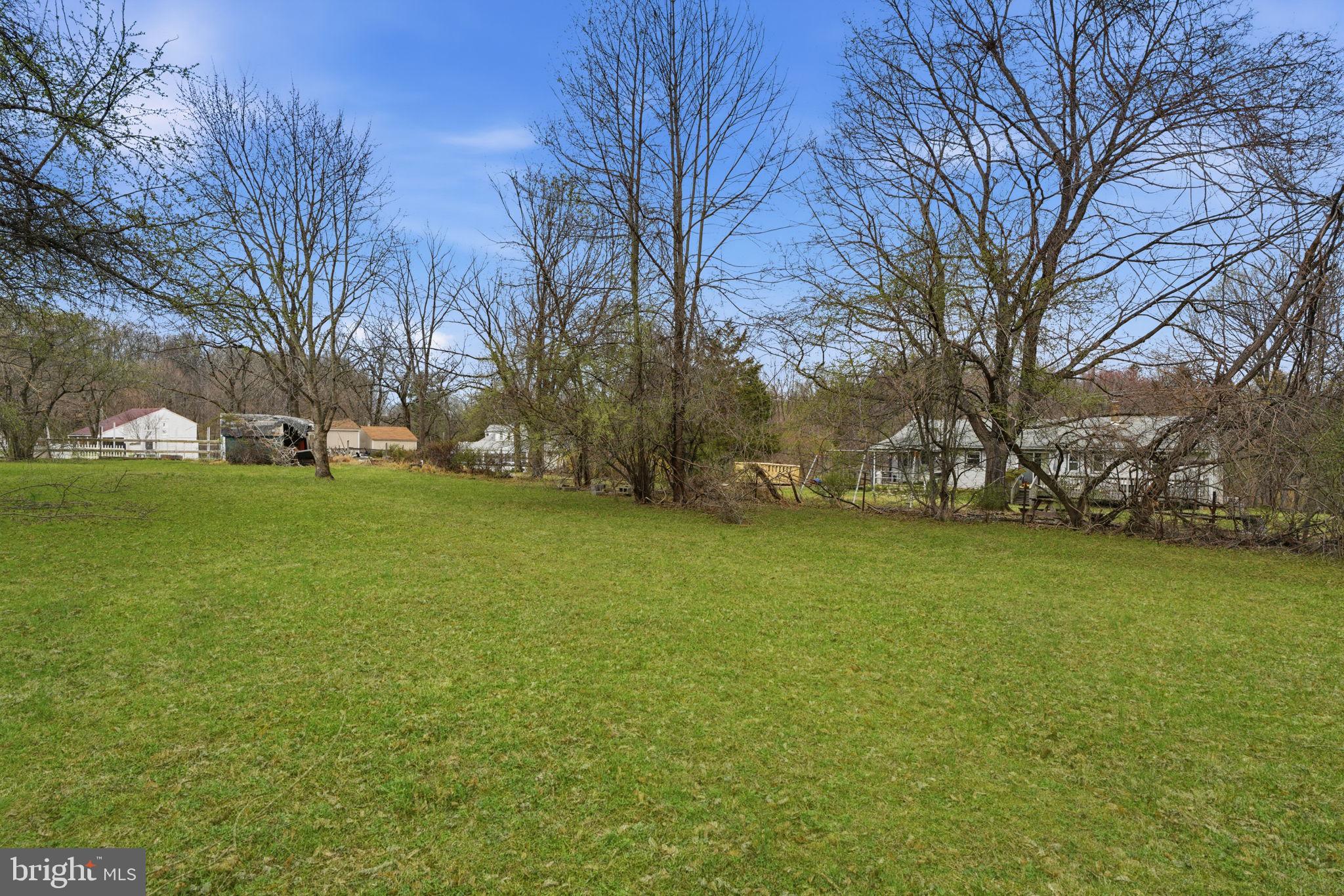34 Aqueduct Road Washington Crossing, PA 18977 - Photo 37 of 38 a view of a field with tree