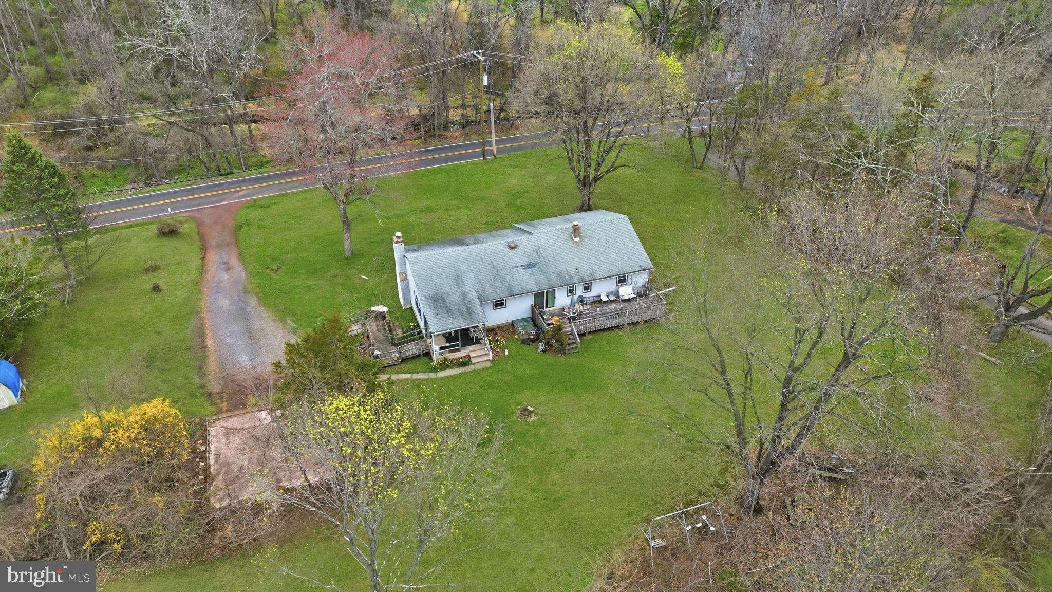 34 Aqueduct Road Washington Crossing, PA 18977 - Photo 6 of 38 a garden view with a lake view