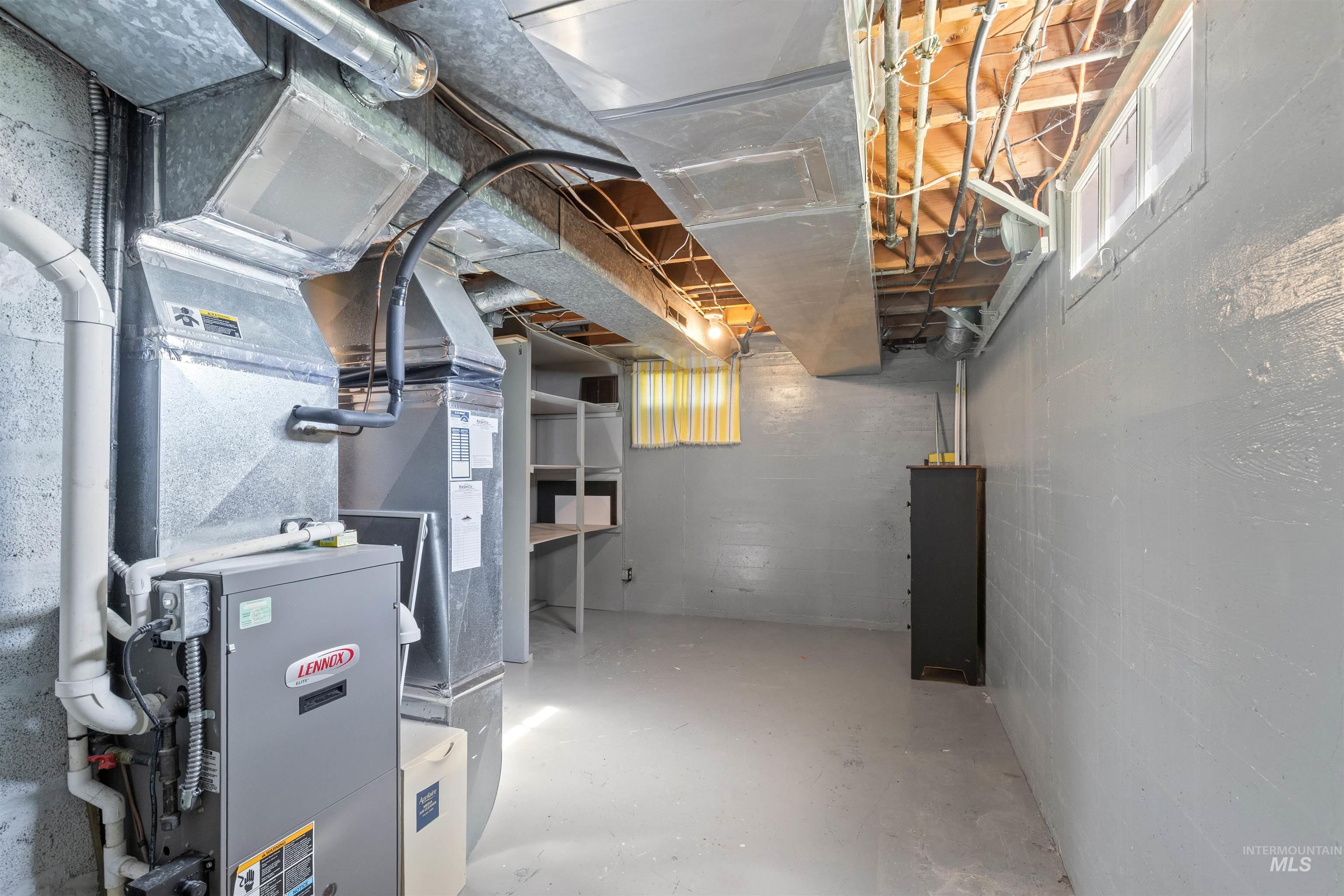 1303 4th Street Clarkston, WA 99403 - Photo 15 of 32 Unfinished basement with heating unit