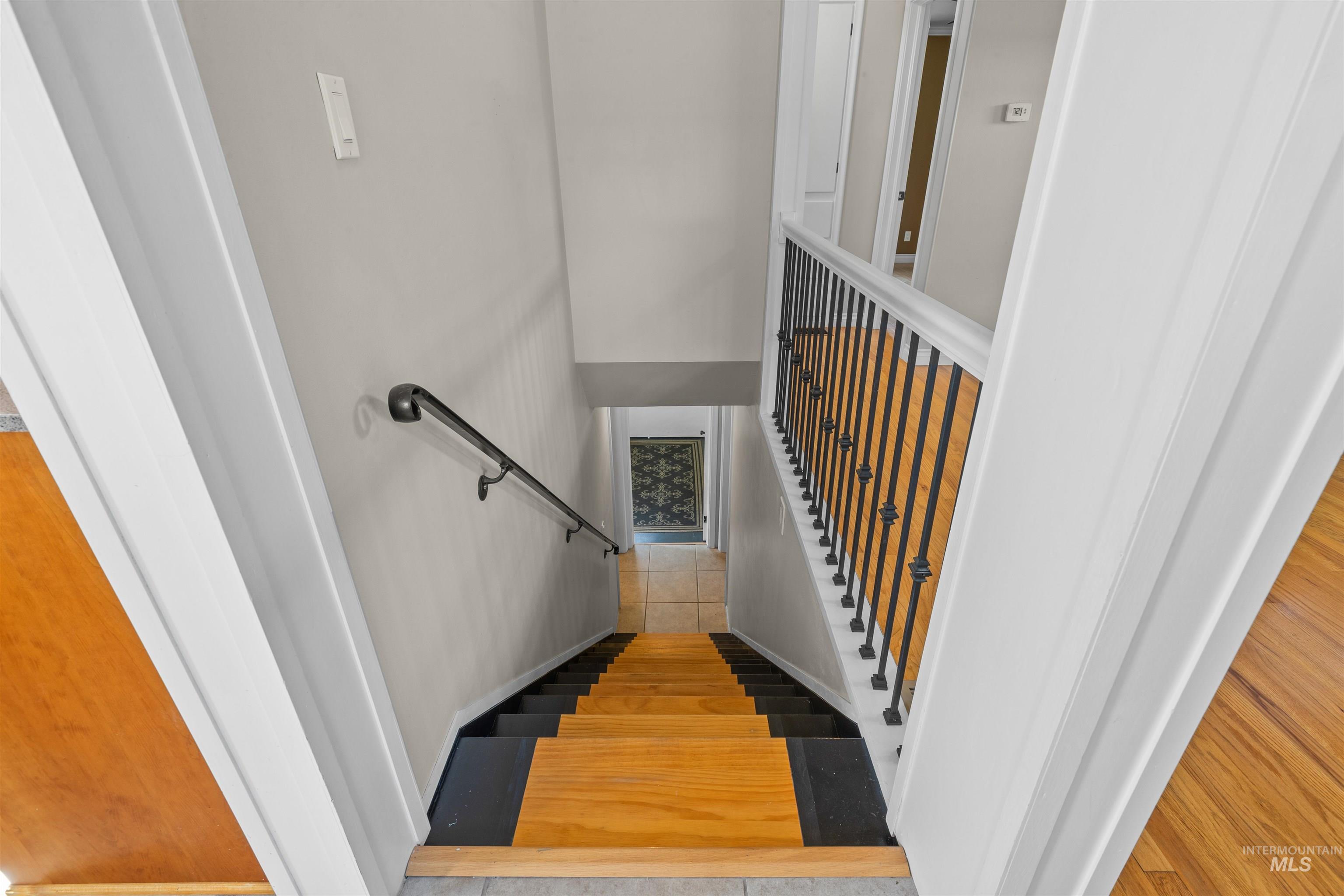 1303 4th Street Clarkston, WA 99403 - Photo 21 of 32 Staircase featuring wood finished floors