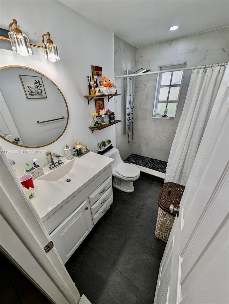 8550 Southwest 109th Avenue, Unit 5101 Miami, FL 33173 - Photo 6 of 8 a utility room with dryer and washer