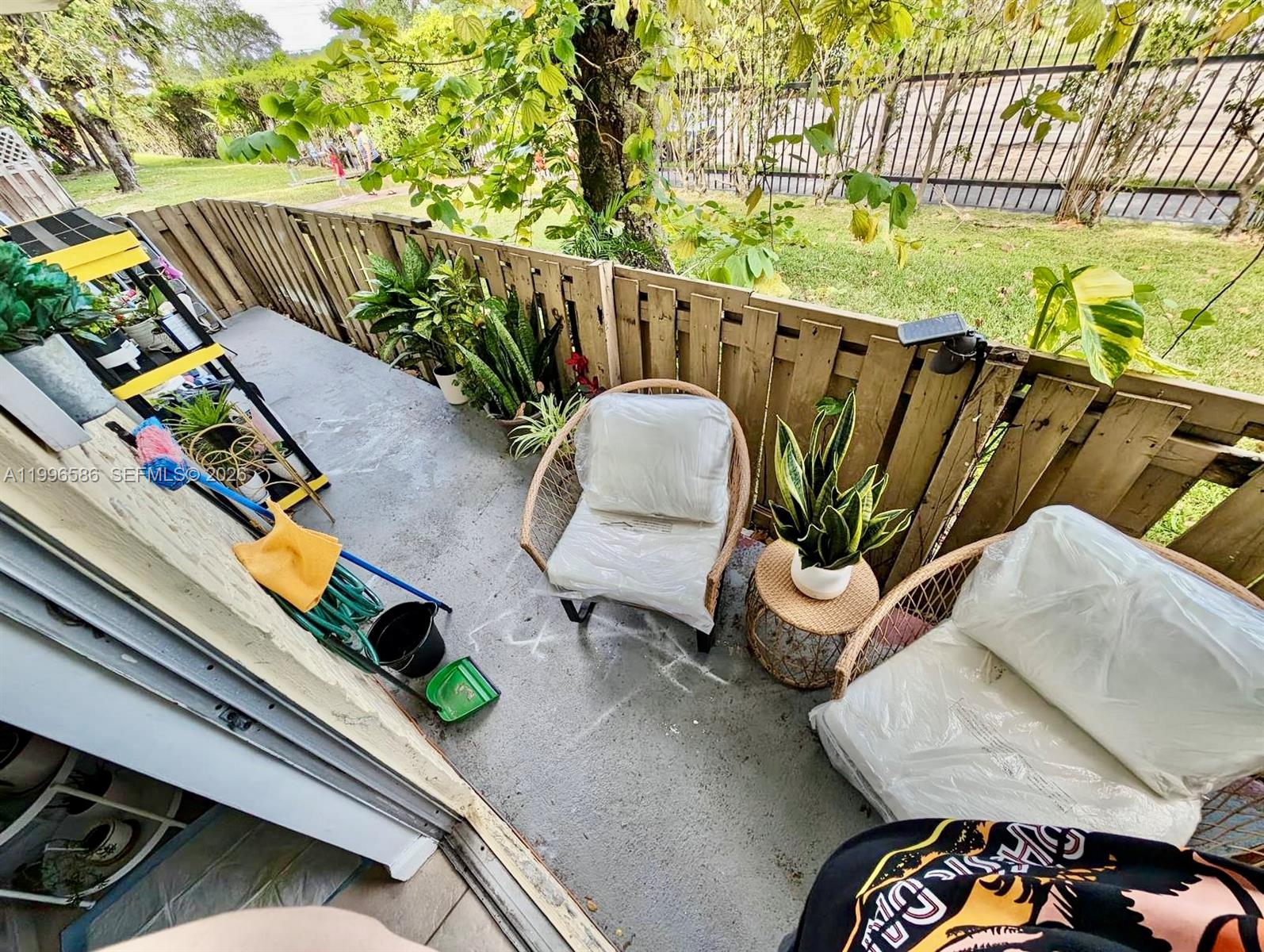 8550 Southwest 109th Avenue, Unit 5101 Miami, FL 33173 - Photo 8 of 8 a view of outdoor space with seating area