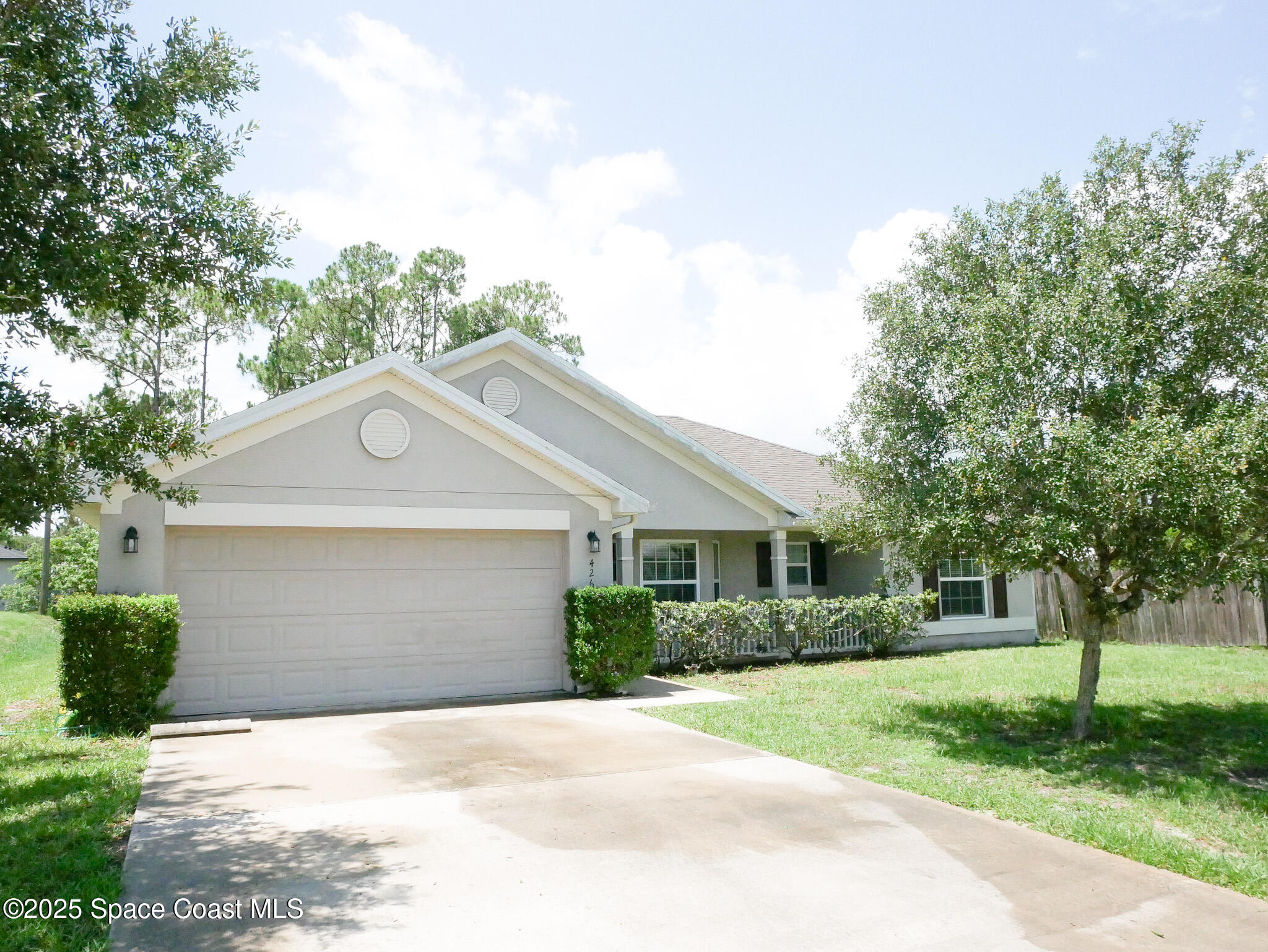 426 Harrisburg Street Southwest Palm Bay, FL 32908 - Photo 1 of 33 Front of the house