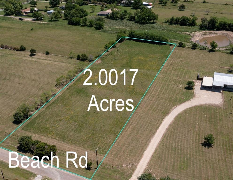 4111 Beach Road Ennis, TX 75119 - Photo 3 of 3 an aerial view of a car park